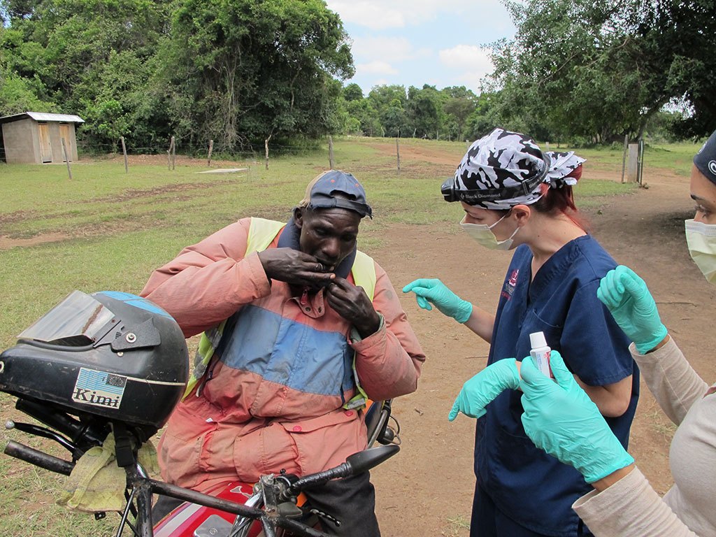 Dr. Ratchford providing dental care in Kenya